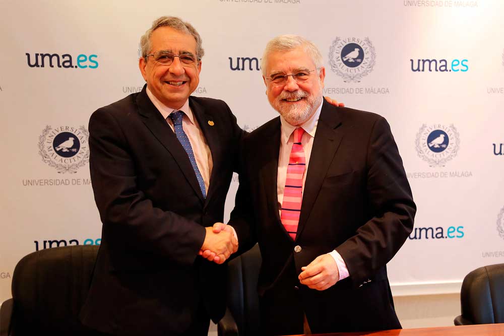 El rector de la UMA con el representante de la Academia San Telmo. 